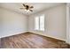 Bedroom features wood-look floors, ceiling fan and window with view at 3331 Center Rd, Chester, SC 29706