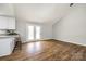 Open dining area featuring wood floors, a breakfast bar, and access to a covered porch at 3331 Center Rd, Chester, SC 29706