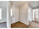 Bright foyer with hardwood floors, a white front door, and neutral wall paint at 3331 Center Rd, Chester, SC 29706