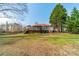 Back exterior showing a screened in porch with deck at 3447 Nesting Ln, Fort Mill, SC 29708