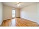 Bright bedroom with hardwood floors and a window offering natural light at 3447 Nesting Ln, Fort Mill, SC 29708