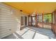 View of covered screened in porch with light and airy feel, access to backyard and a peaceful setting at 3447 Nesting Ln, Fort Mill, SC 29708