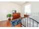 Bright secondary bedroom with natural light, neutral walls, wood floors, and a blue accent rug at 3867 Azalea Trl, Denver, NC 28037