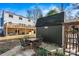 Backyard featuring a dark shed with a seating area outside, perfect for relaxing at 3995 Burton Ln, Denver, NC 28037