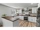 Charming kitchen features butcher block countertops and stainless steel appliances at 3995 Burton Ln, Denver, NC 28037