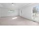 Bright bedroom with neutral decor and stained glass window at 4001 Carmel Acres Dr, Charlotte, NC 28226