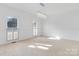 Spacious dining room featuring hardwood floors and natural light at 4001 Carmel Acres Dr, Charlotte, NC 28226