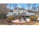 Inviting pool area with patio furniture and lush landscaping at 4001 Carmel Acres Dr, Charlotte, NC 28226