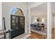 Elegant dining room featuring hardwood floors, a chandelier, and ample natural light at 4004 Blossom Hill Dr, Matthews, NC 28104