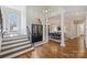 Grand foyer showcasing hardwood floors and entry to the dining and living room at 4004 Blossom Hill Dr, Matthews, NC 28104