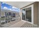 A serene balcony showcases the outdoor space with an inviting atmosphere and sliding glass doors at 432 Burr St, Indian Trail, NC 28079