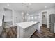 Kitchen featuring a large island with pendant lighting and hardwood floors at 432 Burr St, Indian Trail, NC 28079