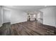 Expansive living area showcasing wood flooring and open floor plan at 432 Burr St, Indian Trail, NC 28079