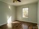 A bedroom with natural light shining through the window and wood floors at 4428 Turkey Ln, Rock Hill, SC 29730