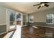 Bright living room with hardwood floors and French doors leading to a lovely outdoor deck at 4428 Turkey Ln, Rock Hill, SC 29730