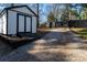 Exterior view of an outbuilding with a gravel driveway at 4428 Turkey Ln, Rock Hill, SC 29730