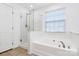 Bathroom boasts a soaking tub and a separate shower at 6019 Queens Walk Ct, Indian Land, SC 29707