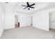 Bright bedroom with ceiling fan and walk-in closet at 6019 Queens Walk Ct, Indian Land, SC 29707