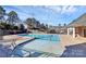 Community swimming pool with a covered patio area at 6019 Queens Walk Ct, Indian Land, SC 29707