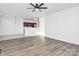 Spacious living room featuring hardwood floors and fireplace at 6019 Queens Walk Ct, Indian Land, SC 29707