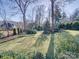 Landscaped backyard with lush greenery at 6020 Havencrest Nw Ct, Concord, NC 28027