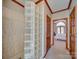 Bathroom with glass block shower, neutral tile, and access to bedroom at 6020 Havencrest Nw Ct, Concord, NC 28027