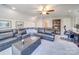 Bonus room featuring a sectional sofa and workspace at 6020 Havencrest Nw Ct, Concord, NC 28027