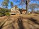 View of the home's back and backyard at 7401 Limerick Dr, Charlotte, NC 28270