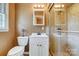 Modern bathroom featuring a glass-enclosed shower, toilet, and white vanity with convenient mirror and lighting at 7707 Ritter Dr, Charlotte, NC 28270