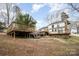 Expansive backyard featuring a multilevel deck, perfect for enjoying the outdoors and entertaining guests at 8025 Cliffside Dr, Charlotte, NC 28270