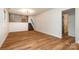 Finished basement features updated flooring and staircase at 8025 Cliffside Dr, Charlotte, NC 28270