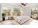 Bright and airy bedroom with a large window, plush bed, and elegant decor at 8025 Cliffside Dr, Charlotte, NC 28270