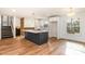 Modern kitchen featuring a center island and stainless steel appliances at 8025 Cliffside Dr, Charlotte, NC 28270