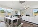 Open concept dining room with seating for six and hardwood floors at 8348 Acadia Pkwy, Sherrills Ford, NC 28673