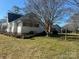 Spacious backyard with well-maintained lawn and mature trees at 897 Mocksville Hwy, Statesville, NC 28625