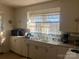 Traditional kitchen with under-cabinet storage, microwave and standard-sized sink at 897 Mocksville Hwy, Statesville, NC 28625