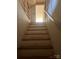 Interior stairway with wooden handrail leading to the upper level at 897 Mocksville Hwy, Statesville, NC 28625