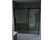 Modern bathroom features a glass shower door and a clean design aesthetic at 105 N Inman Ave, Bessemer City, NC 28016