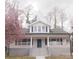 Beautiful two-story home with a welcoming covered porch, showcasing classic architectural details and curb appeal at 105 N Inman Ave, Bessemer City, NC 28016