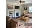 Comfortable living room with stylish furnishings, a fireplace, and natural light at 105 N Inman Ave, Bessemer City, NC 28016