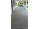 Spacious covered front porch with painted floor and a charming outdoor space at 105 N Inman Ave, Bessemer City, NC 28016
