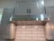 Stainless steel range hood over a white subway tile backsplash at 105 N Inman Ave, Bessemer City, NC 28016