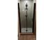 Walk in shower with black trim and tile walls at 105 N Inman Ave, Bessemer City, NC 28016