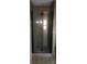 Modern tiled shower with seamless glass door and contemporary fixtures offers a spa-like experience at 105 N Inman Ave, Bessemer City, NC 28016