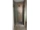 Walk-in shower boasts sleek, modern design with stylish tile and glass door, enhancing bathroom aesthetic at 105 N Inman Ave, Bessemer City, NC 28016