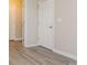 Clean hallway with light walls and hardwood floors at 106 Eighth St, York, SC 29745