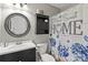 A delightful bathroom featuring black fixtures, a lovely shower curtain, and modern design at 107 Deese Ct, Indian Trail, NC 28079