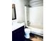 The bathroom has a tub and shower combination, a dark vanity, and wood look floors at 10933 Harrowfield Rd, Charlotte, NC 28226
