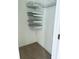 Efficient closet space equipped with wire basket shelving, maximizing vertical storage at 10933 Harrowfield Rd, Charlotte, NC 28226