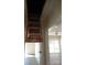 Attic access ladder leads to storage space with views of the lake and door on the ground floor at 1120 Cedar St, Mount Holly, NC 28120